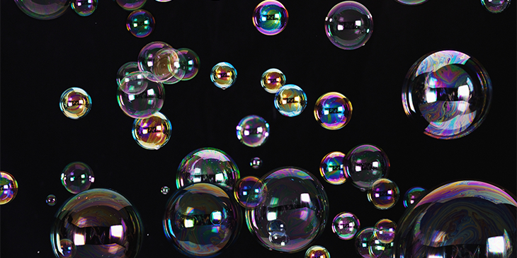 Differently sized bubbles reflecting images