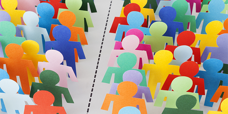 Two groups of colourful cut-out people divided by a dotted line