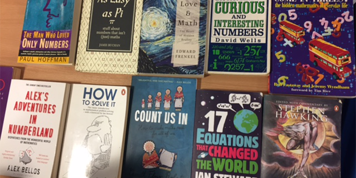 Assortment of books on maths placed on a table
